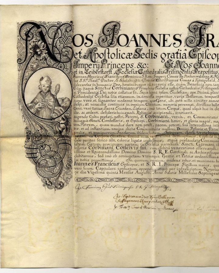 Schenkung von Reliquien des Heiligen Korbinian an dessen Heimatpfarrei Arpajon durch Bischof und Domkapitel von Freising; kalligraphisch gestaltete Pergamenturkunde vom 25. August 1711