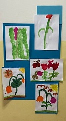 verschiedene von den Kindern gemalte Frühlingsblumen