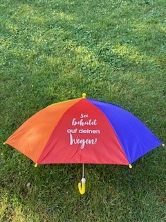 Regenschirm mit Segenswunsch