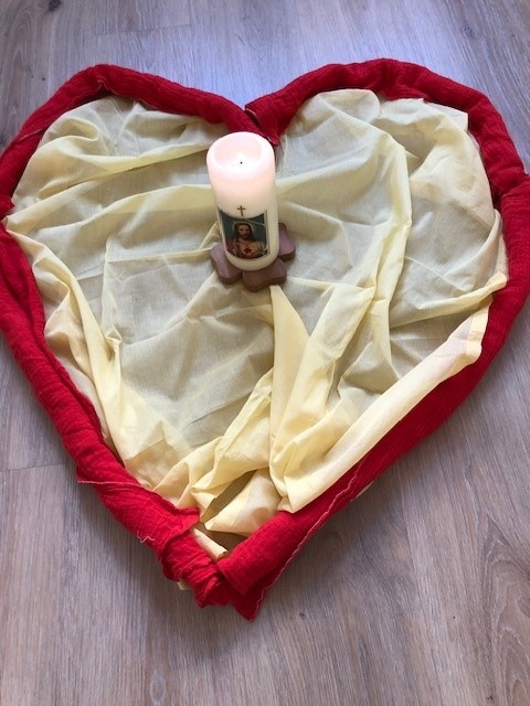 Herz mit Jesuskerze
